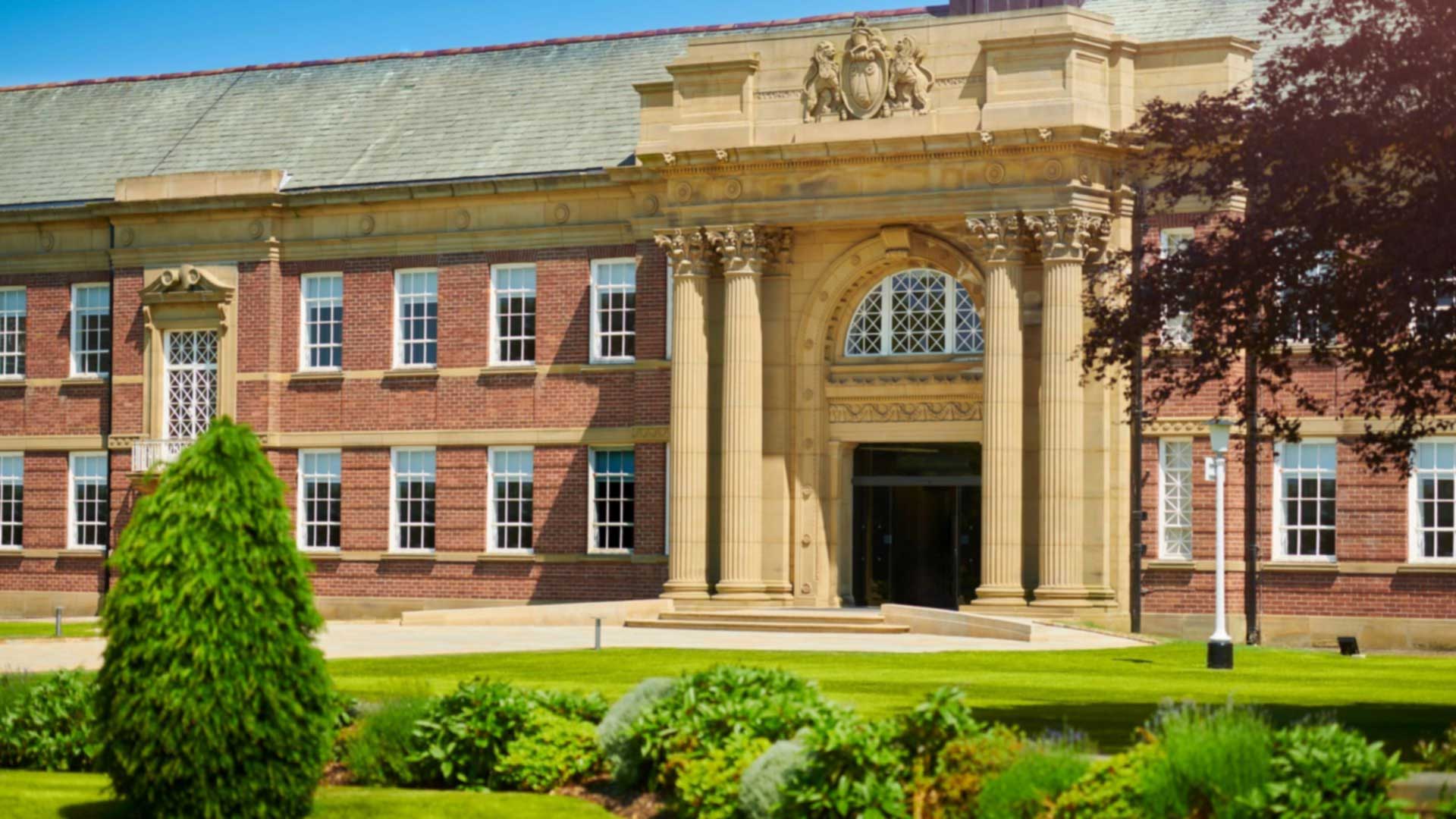 Front entrance of the Main Building in the summer