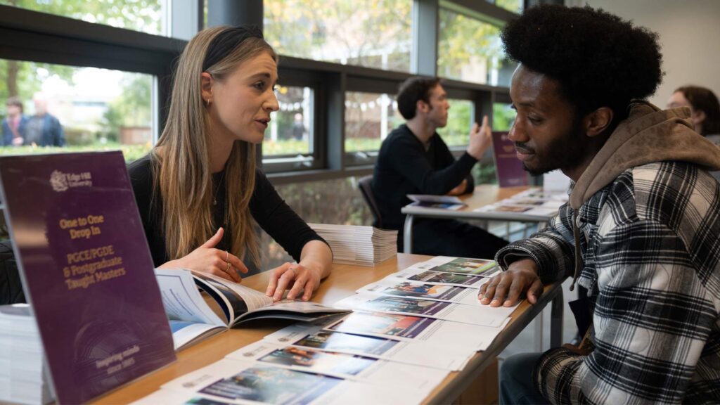 A prospective postgraduate student and a member of staff during an open day one-to-one session