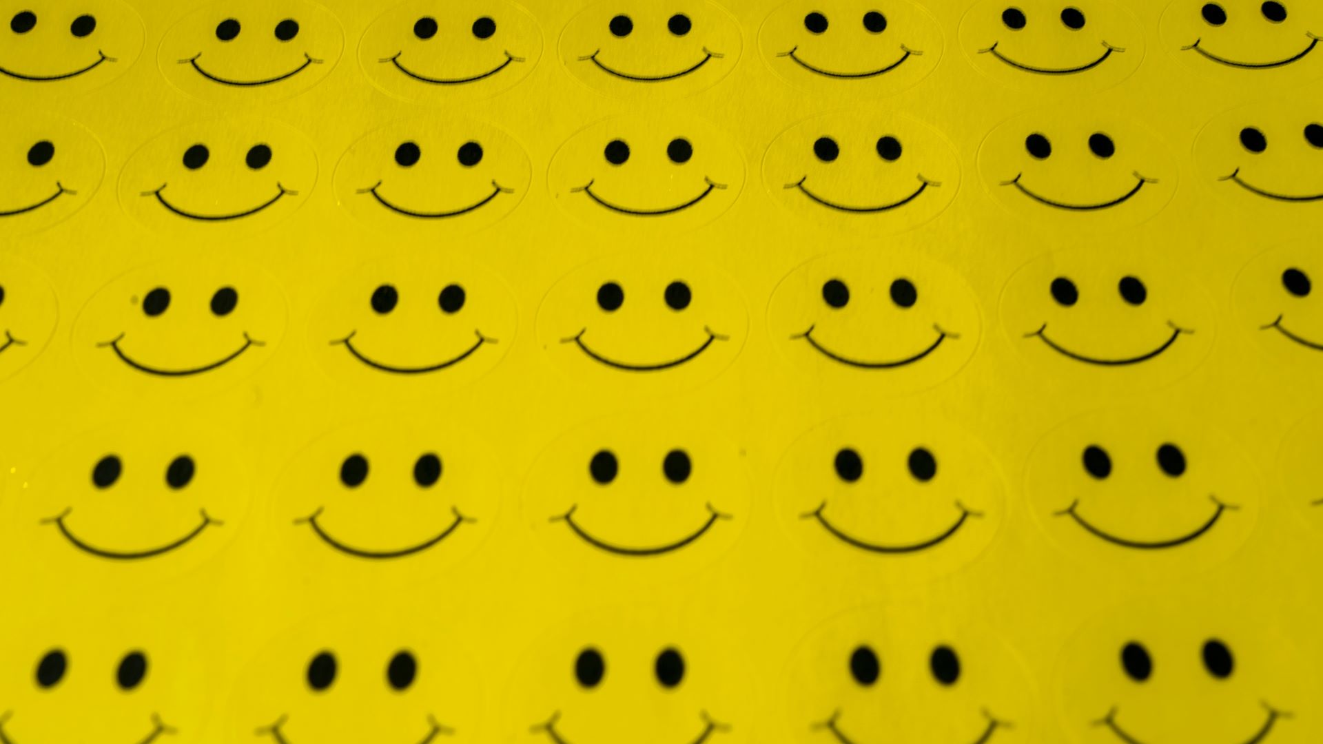 Rows of smiley face stickers