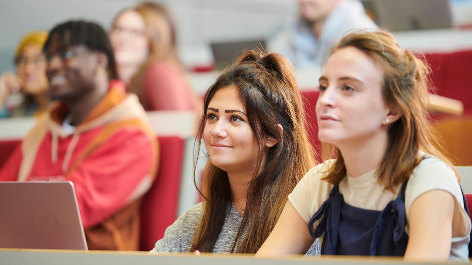 Students listen attentively during a lecture.