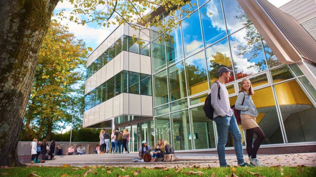 Students walking outside the Tech Hub building