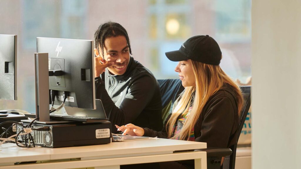 Two students working together in the Catalyst building